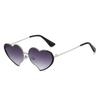 Metal frame sunglasses, heart-shaped sunglasses, quirky sunglasses, street style, trendy sunglasses