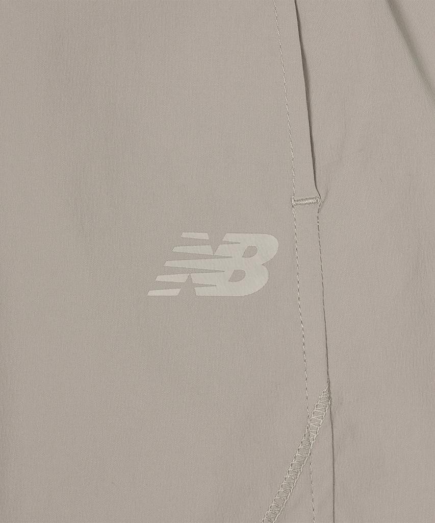 New Balance Nbnvg3W612 / Женские эластичные шорты-полубриджи Frozen Woven Stretch Essential (D/Бежевый)