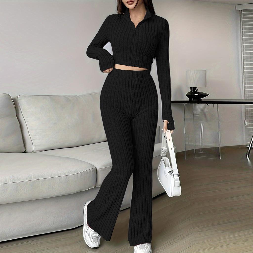 Женский модный однотонный ребристый костюм из двух частей с застежкой-молнией, коротким топом с длинными рукавами и расклешенными брюками с высокой талией