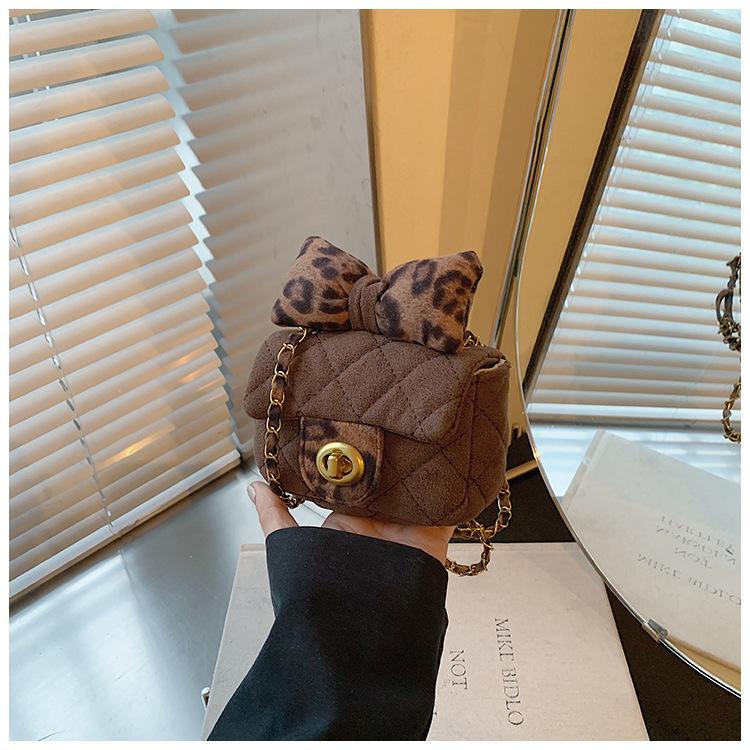 Новая женская сумка с ромбовидным бантом.