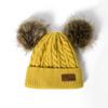Вязаная детская шапочка с помпонами