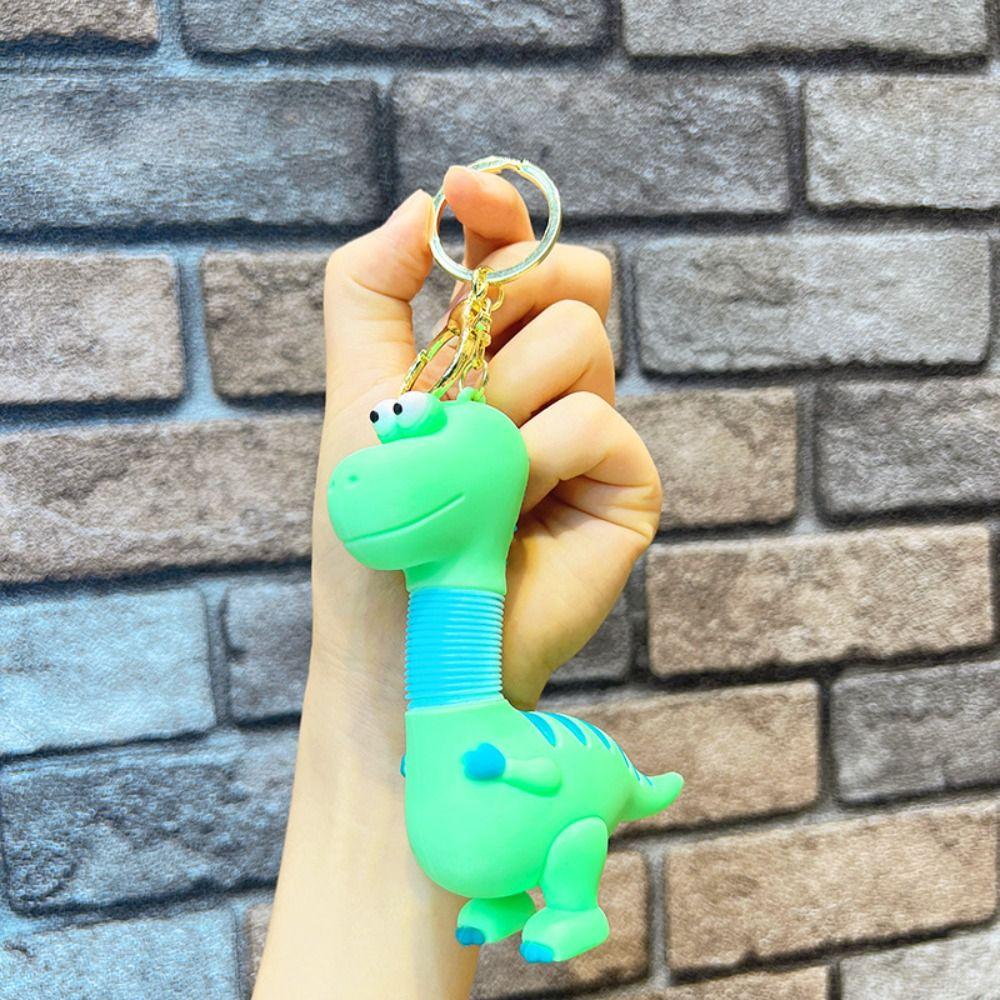 Силиконовый выдвижной шнурок на шею брелок динозавр выдвижной брелок динозавр детские подарки