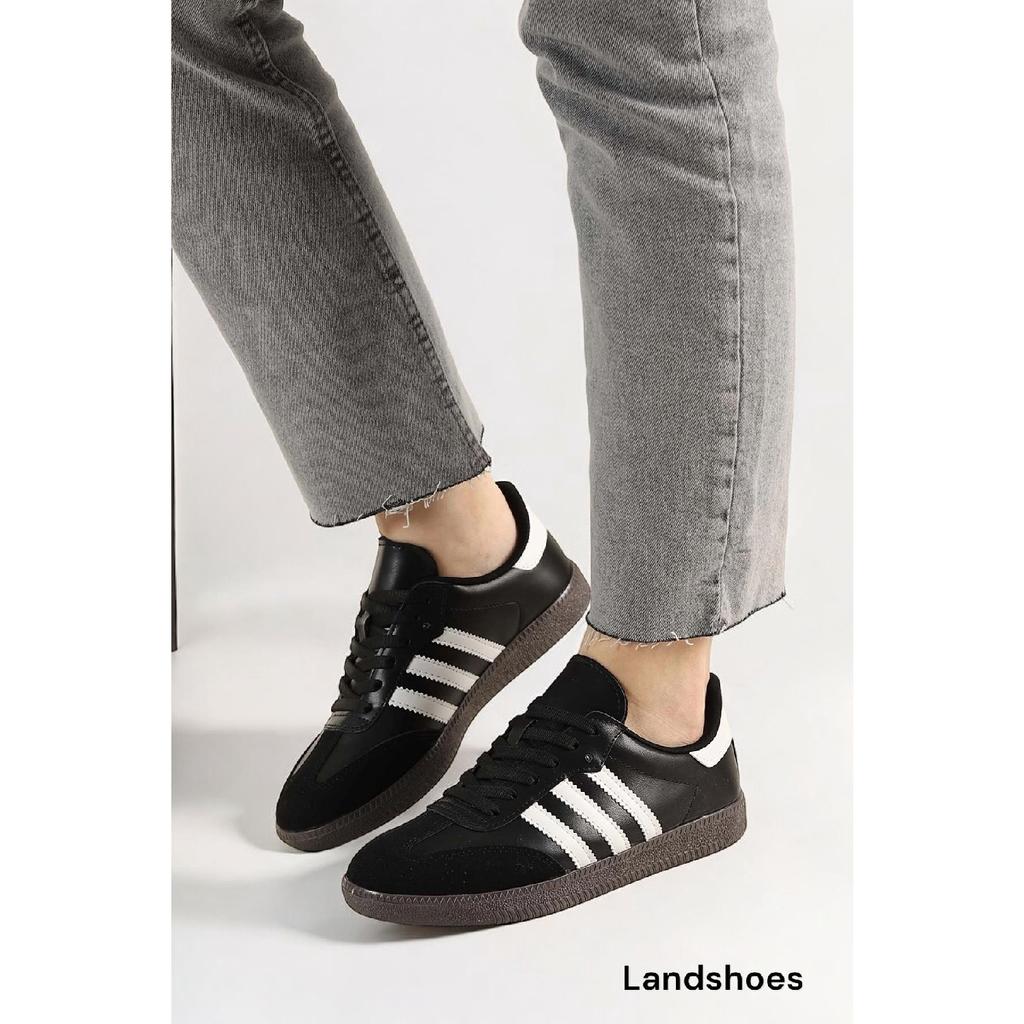 Бело-черные спортивные туфли унисекс в полоску на плоской подошве со шнуровкой