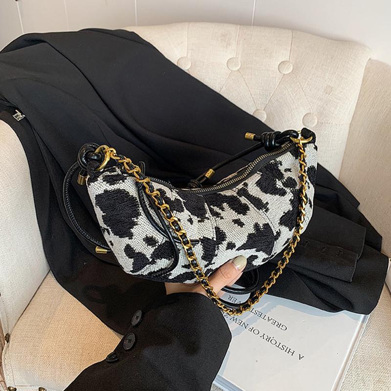 Versatile Cow Pattern Bag Women's New Fashion Trend Splicing Horn Bag Simple Canvas Messenger Bag CLE