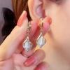 Elegant Teardrop Cat's Eye Stone Clip Earrings with Diamonds