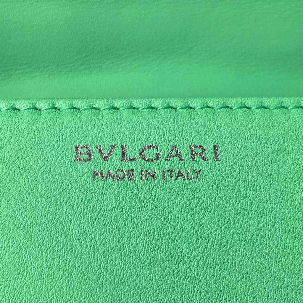 Б/у женская сумка через плечо BVLGARI из зеленой кожи