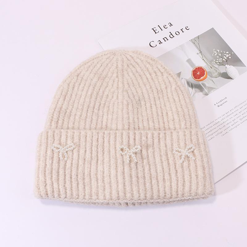Small pearl knot knitted hat Korean version casual versatile face small winter warm hat