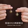 Wooden earrings made of green sandalwood, natural agarwood, and wood, with hook-shaped sandalwood pendants, in a new Chinese style