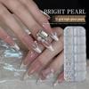 Bright Pearl Nail Art Decorations: Mixed Pack of Half-Round & Full Round White Pearls in Various Sizes for 3D Designs.