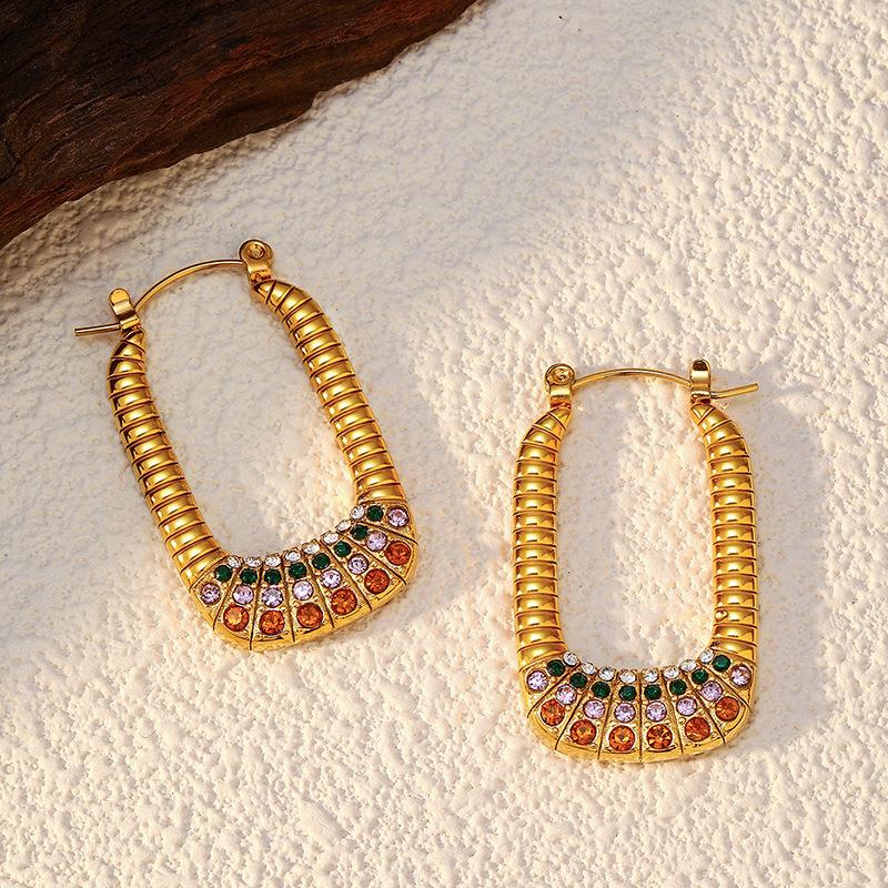 Fashion temperament niche personality earrings stainless steel plated 18K gold retro twist snail shell micro-inlaid earrings