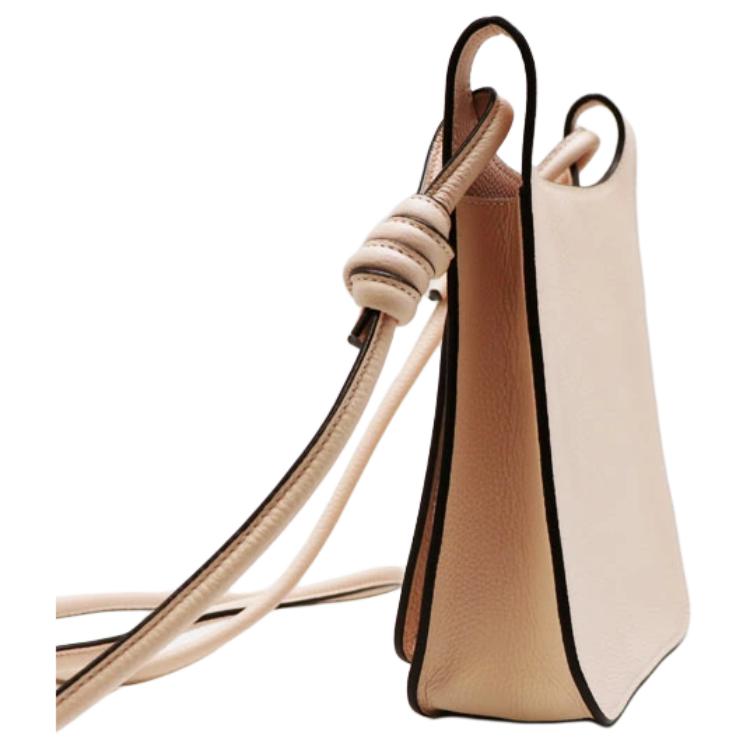 MCM Light Beige Pebbled Leather Vertical Crossbody Bag with Embossed Logo for Daily Use