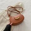 Retro fashion simple temperament commuter shoulder bag women's early spring texture underarm bag Korean version saddle bag tide