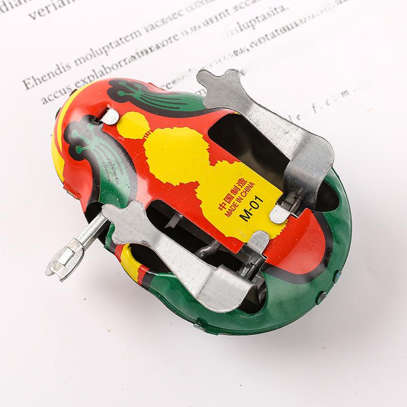 Оптовая продажа заводной прыгающей куклы Tin Frog и других ностальгических жестяных игрушек