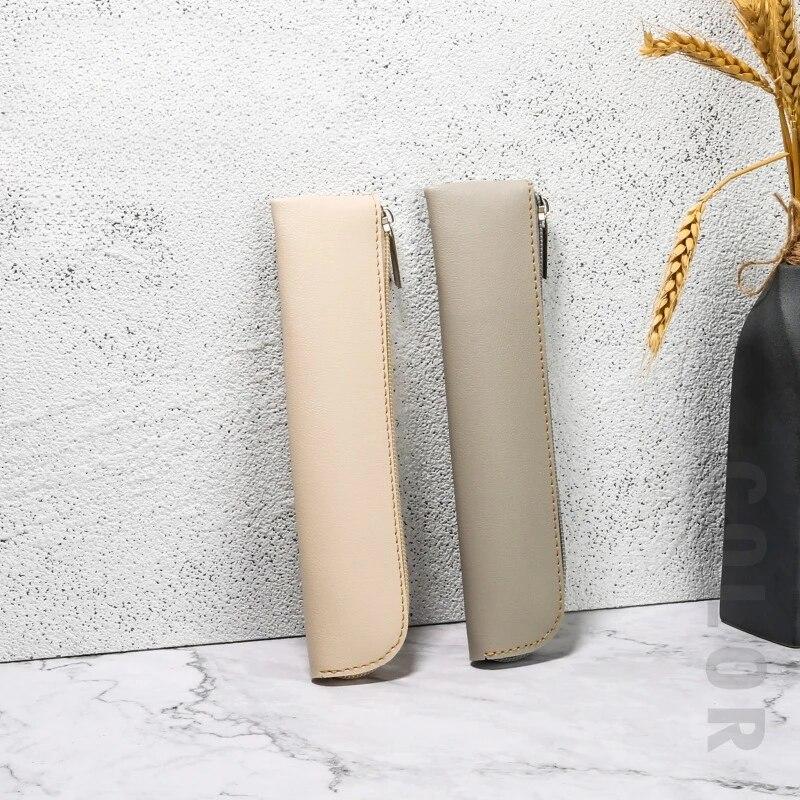 Маленькие изысканные сумки-карандаши из искусственной кожи. Красивые однотонные сумки для ручек. Простые легкие сумки для ручек. Сумки на молнии.