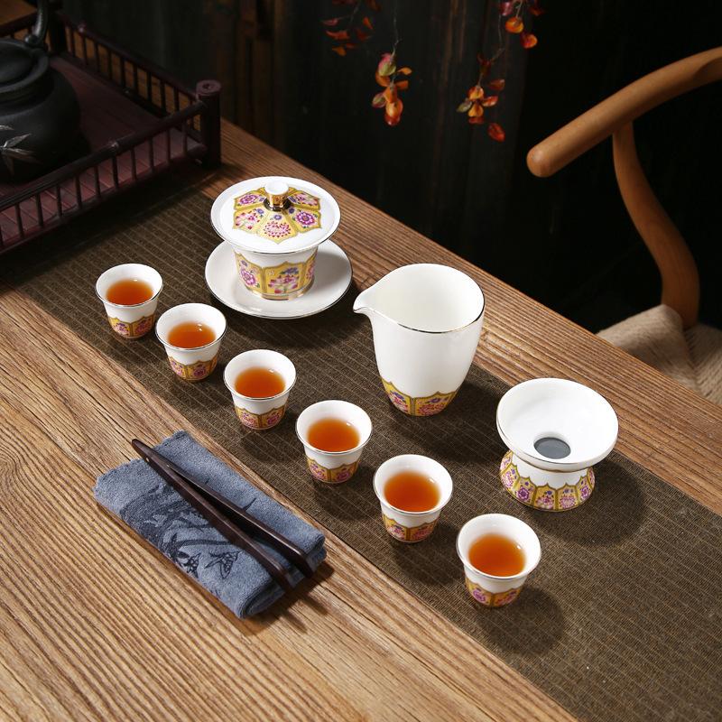 Enamel color suet jade kung fu white porcelain blue and white porcelain, pinched gold silk grilled flower cover bowl tea set can be printed