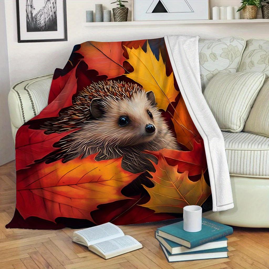 A Cozy And Warm Autumn Decoration Featuring a Hedgehog And Maple Leaves Flannel Blanket, Made of Soft Polyester with Digital Printing, Suita