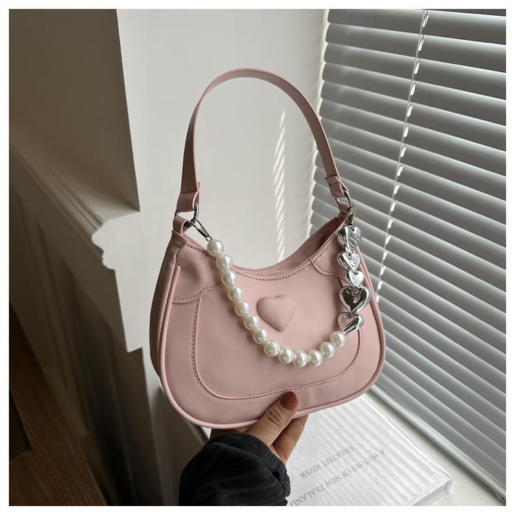 Жемчужная сумочка женская 2024 новая трендовая корейская нишевая сумка подмышку премиальная иностранная сумка-мессенджер сумка на плечо