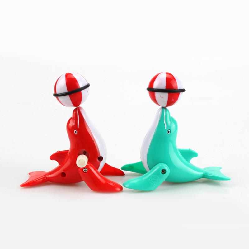 Mechanical Dolphin Rotating Toy With Chain Link Top Ball For Kids Learning And Interactive Play