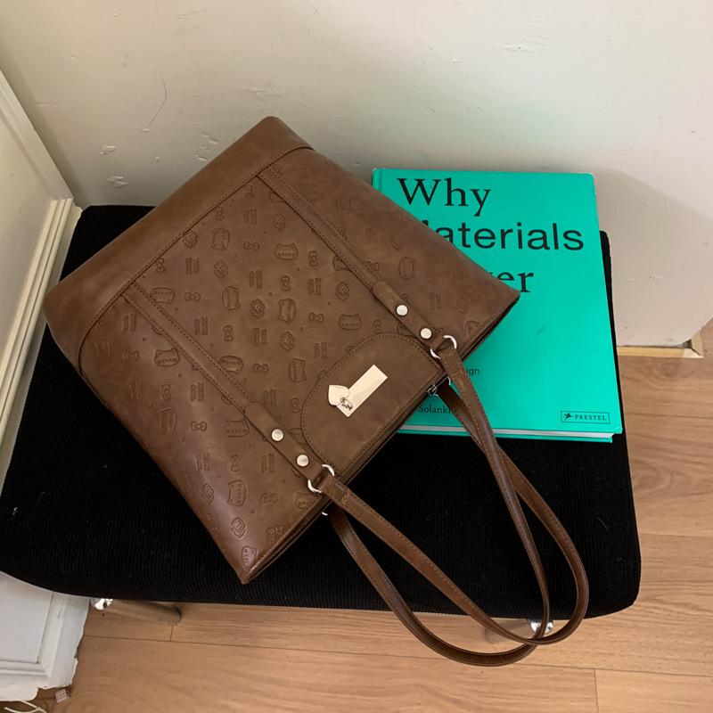 Embossed tote bag women's large capacity 2025 new autumn and winter versatile casual shoulder bag multi-functional backpack backpack