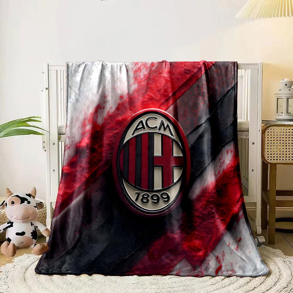 Red and black textured diagonal streaks with a central oval emblem. for all seasons blanket lunch break throw gift