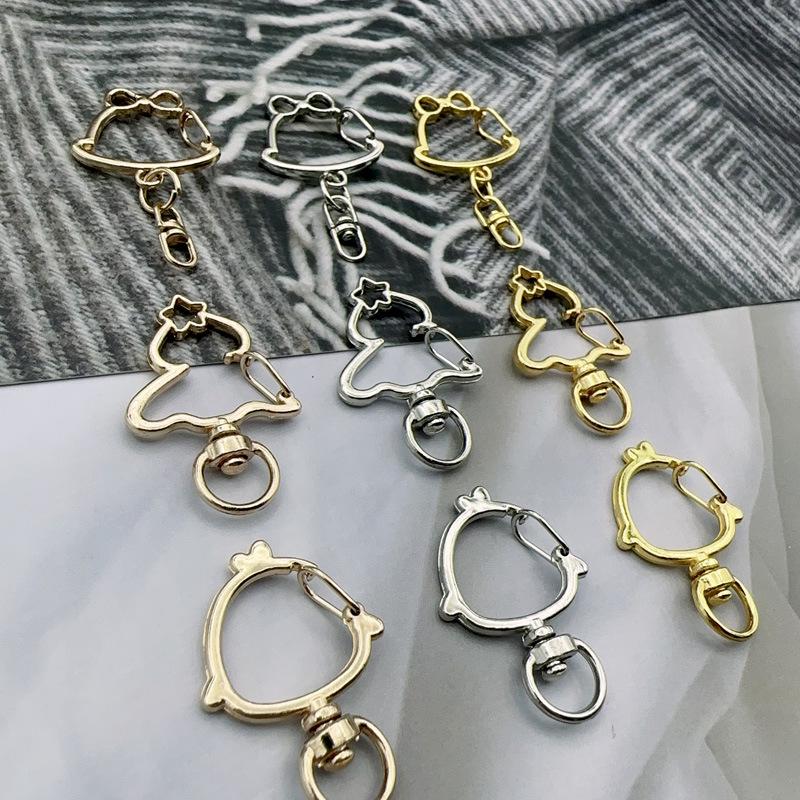 Handmade Metal Rotating Chick Keychain with Christmas Bell and Color Retention.