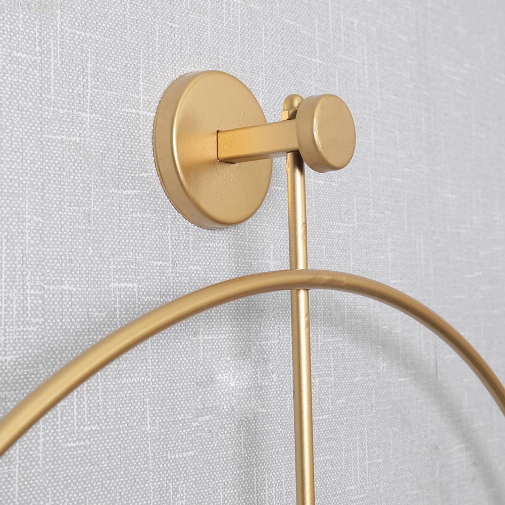 Испанский свет Роскошные простые настенные часы: Креативный дизайн железного кольца с модной функцией качания для домашнего декора.