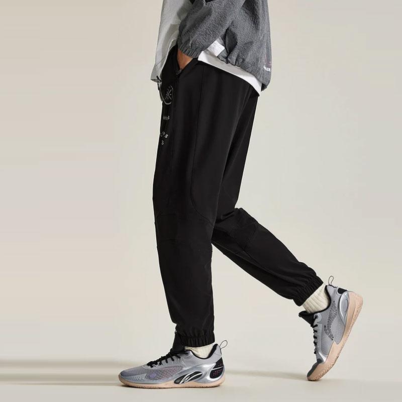 Штаны спортивные мужские Li Ning Wade Series однотонные светоотражающие с защитой от солнца и льда, трикотажные, черные AKYU017-1
