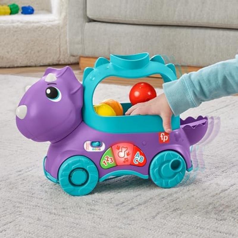 Игрушка-каталка Fisher-Price «Динозавр с шариками», Французская версия, Интерактивный ходунок-развивашка со светом и музыкой для детей от 1 до 3 лет