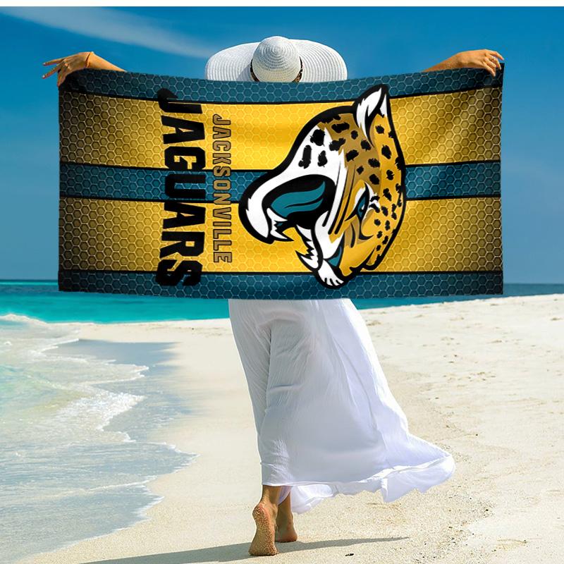 proof beach towel with Jacksonville Jaguars logo pattern - soft,absorbent,quick-drying,machine washable - perfect for swimming,camping,bathing