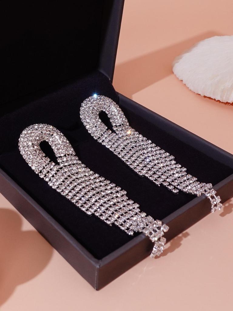 Luxurious Diamond Tassel Earrings: Shimmering, High-End Fashion for Exquisite European & American Style Party Wear.