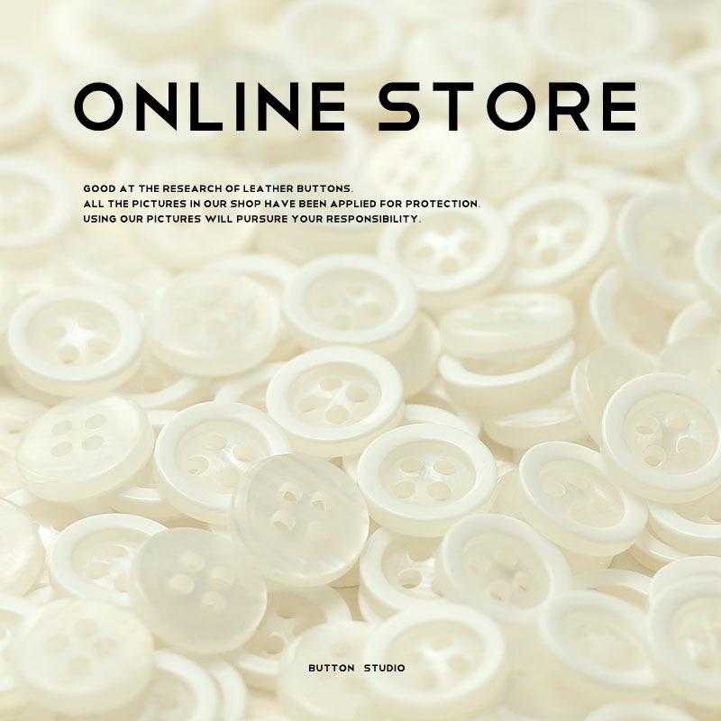 Черно-белые перламутровые пуговицы из искусственной смолы для рубашки, пуговицы для трикотажного кардигана с длинными рукавами и четырьмя люверсами, воротник