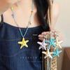 Смелое дофаминовое колье-чокер с цветными блоками в виде морской звезды и цепочка для свитера - Женская коллекция 2025