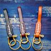 Braided Vegetable-Tanned Cowhide Keychain with Brass Horseshoe Buckle