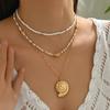 Starfish & Conch Pendant Necklace - Versatile Fashion Jewelry with Rice Bead Clavicle Chain for Women.
