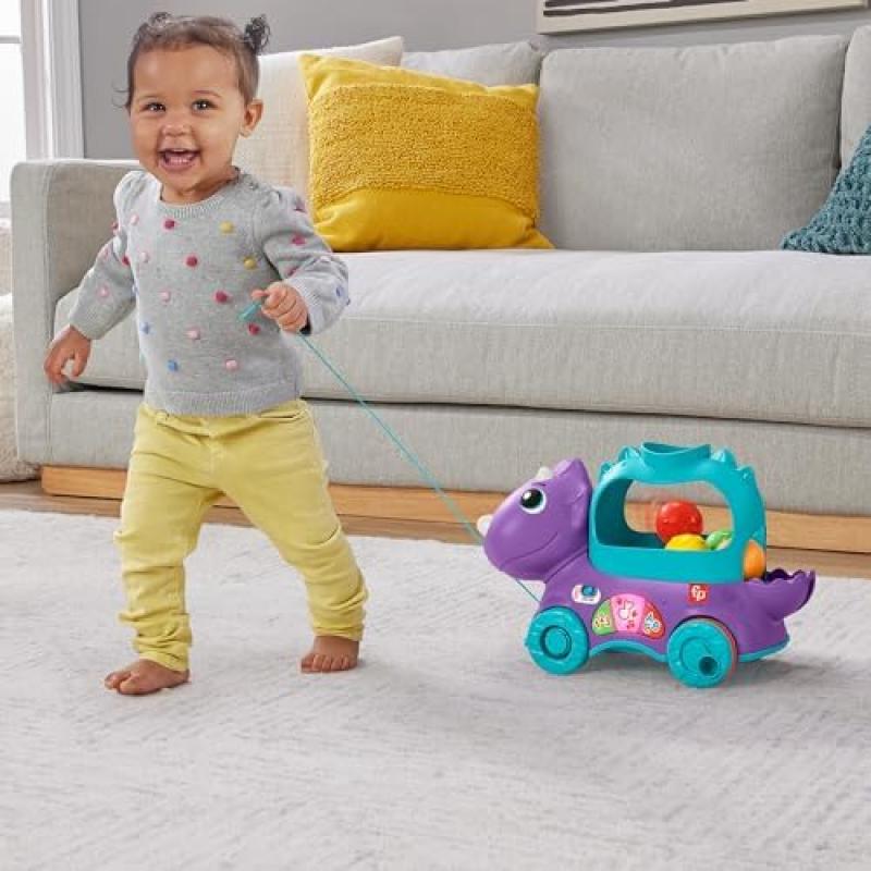 Игрушка-каталка Fisher-Price «Динозавр с шариками», Французская версия, Интерактивный ходунок-развивашка со светом и музыкой для детей от 1 до 3 лет