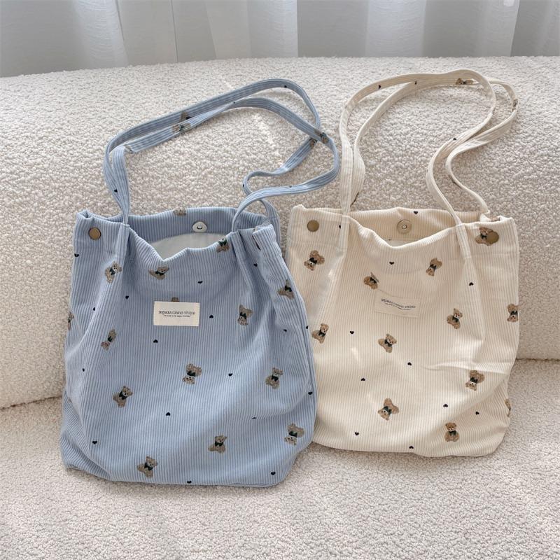 Copyright model, corduroy cartoon printed bear large-capacity portable shoulder bag, student armpit bag for class