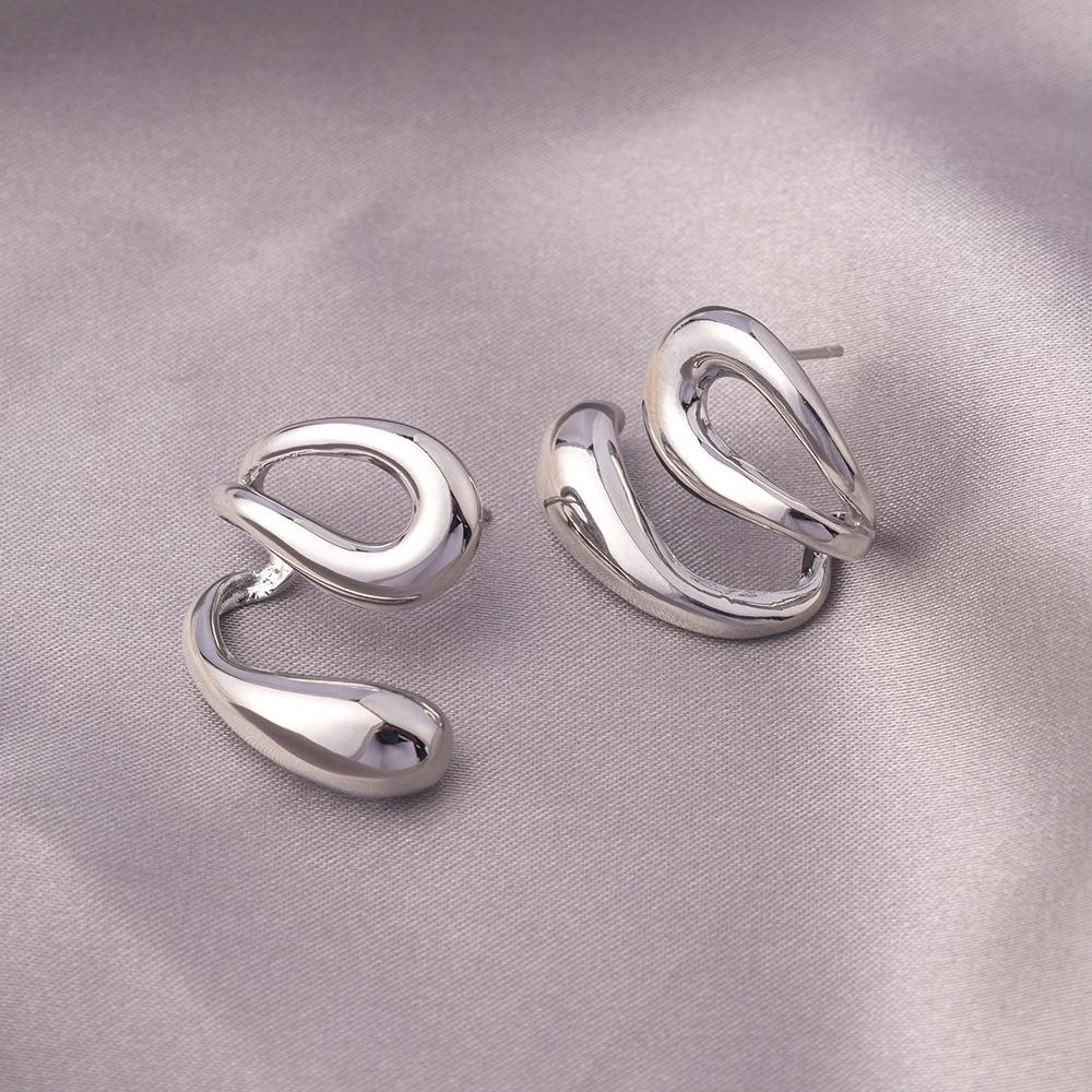 Серьги-иглы из серебра 925 пробы: Легкая роскошь, высококлассные пусеты и универсальный нишевый дизайн в виде колец для работы и стиля