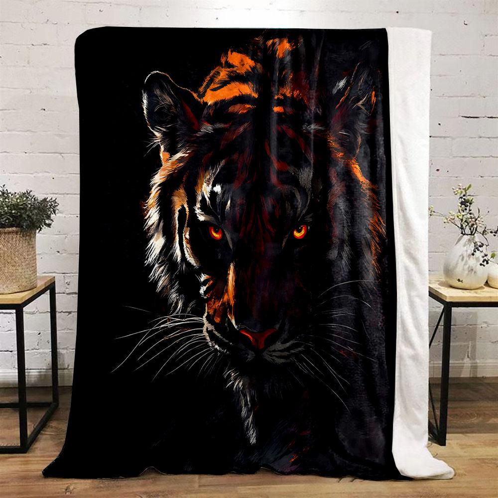 "Fierce Tiger with Glowing Eyes" Patterned flannel blanket perfect for the bedroom living room, sofa, or a little nap