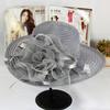 Spring and summer mesh sun hat Eugen yarn flower temperament wedding hat sun protection dome big eaves hat fashion hat women