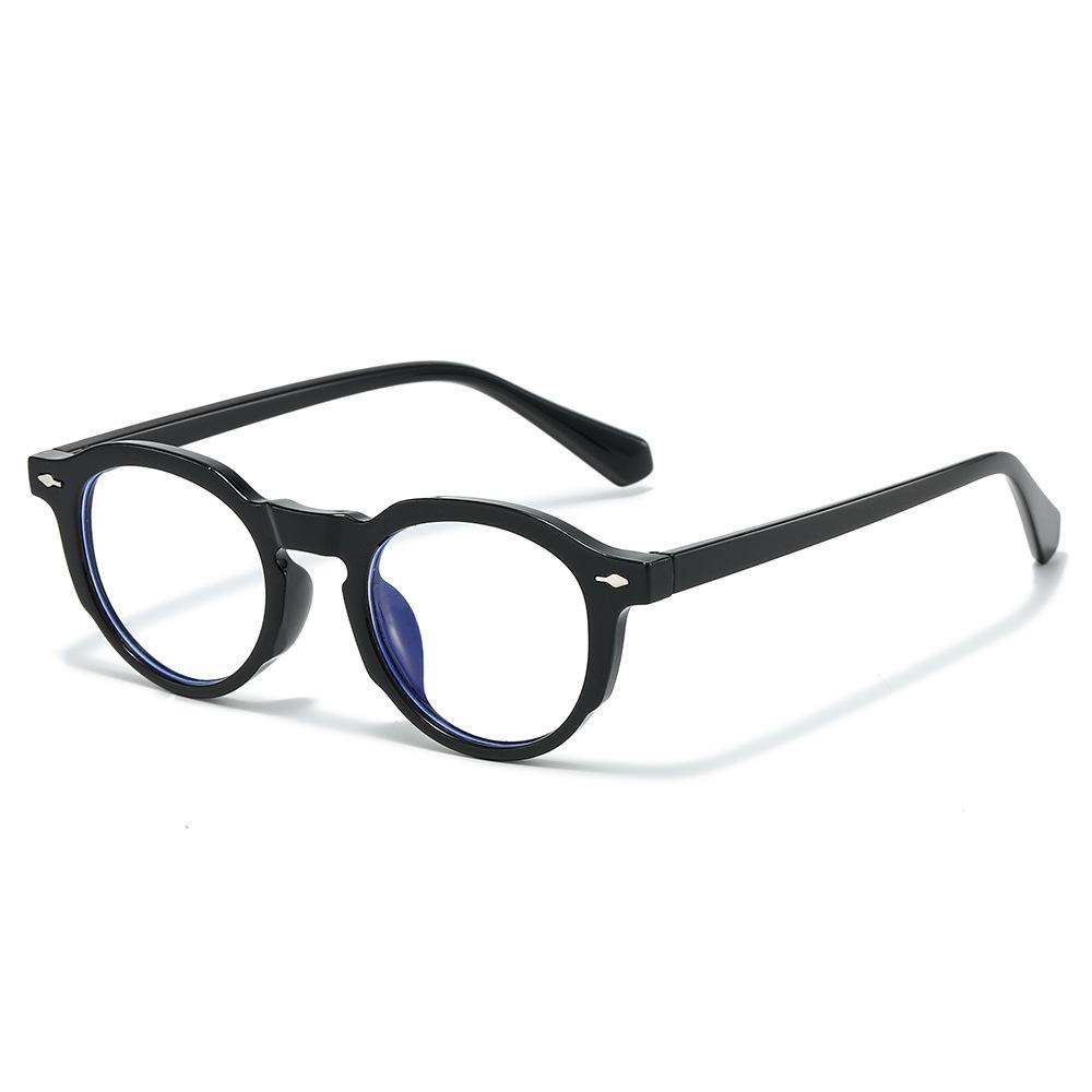 New round street fashion sunglasses, European and American retro simple metal tooth PC sunglasses