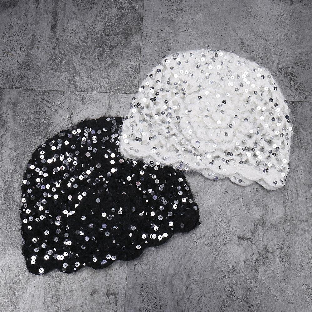 Autumn and winter new fashion sequin decorative hollow headgear knitted flower temperament warm wool hat