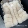 Get the goods and contact customer service. The new fox fur vest is not retail.