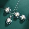 Three-piece Australian Fritillary Pearl Necklace Silver Needle Tahitian Pearl Stud Earrings with Emerald Zircon Ring