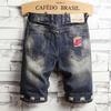 Men's Casual And Loose Hole Stitching Drape Characteristic Foot Denim Shorts