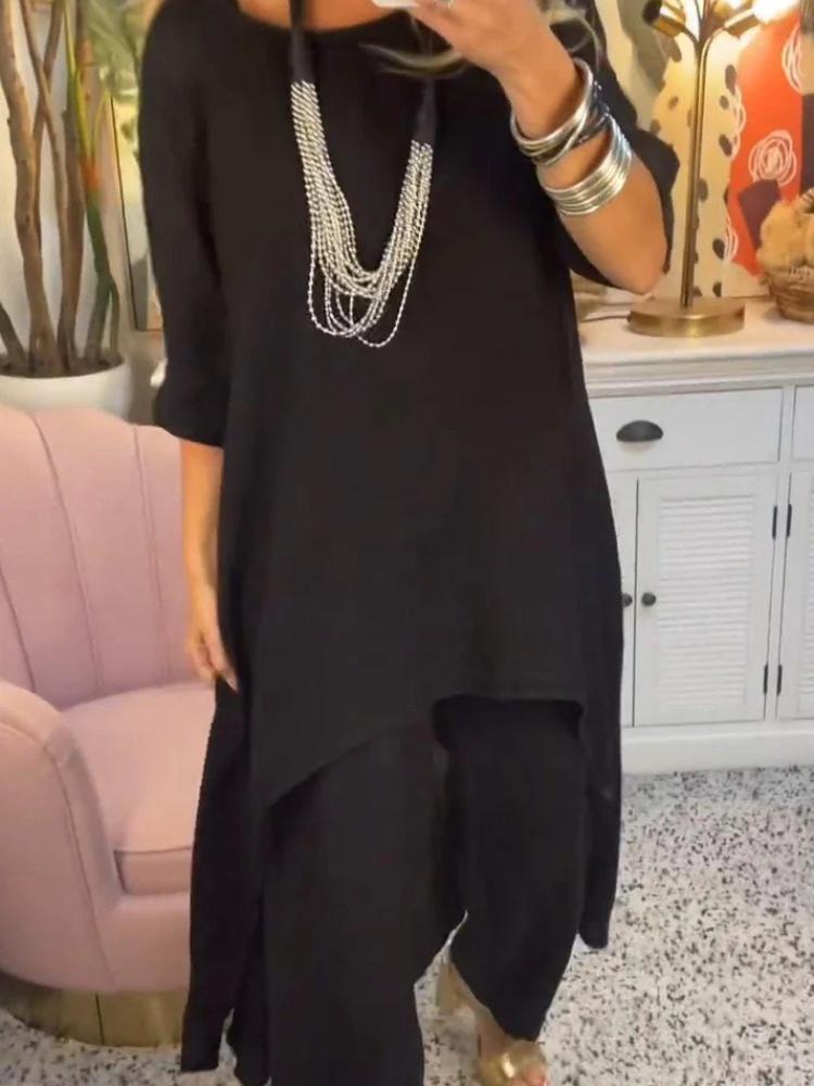 Женский комплект из свободной блузки с асимметричным подолом и брюк широкого кроя в нескольких цветах