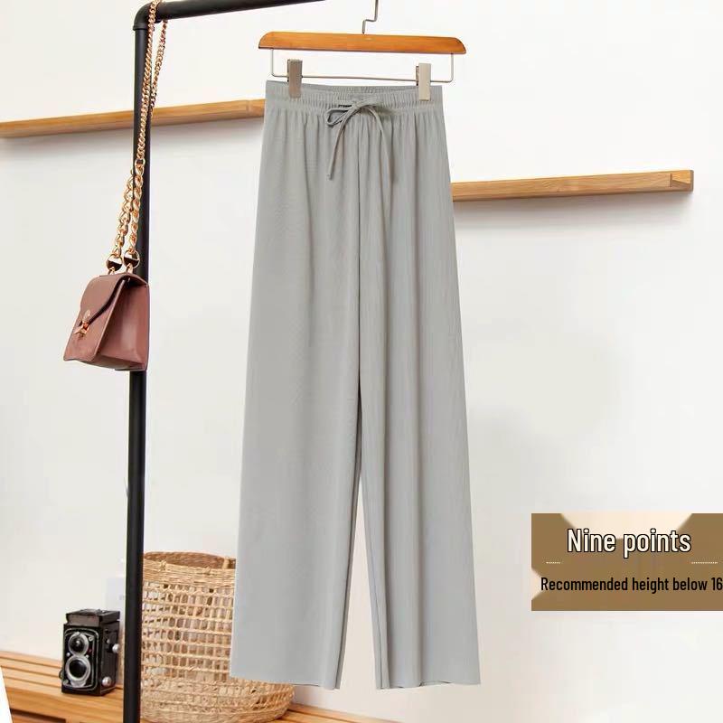 Женские брюки с высокой талией и широкими штанинами из ледяного шелка на весну/лето - Свободные, стройнящие, длиной до пола.