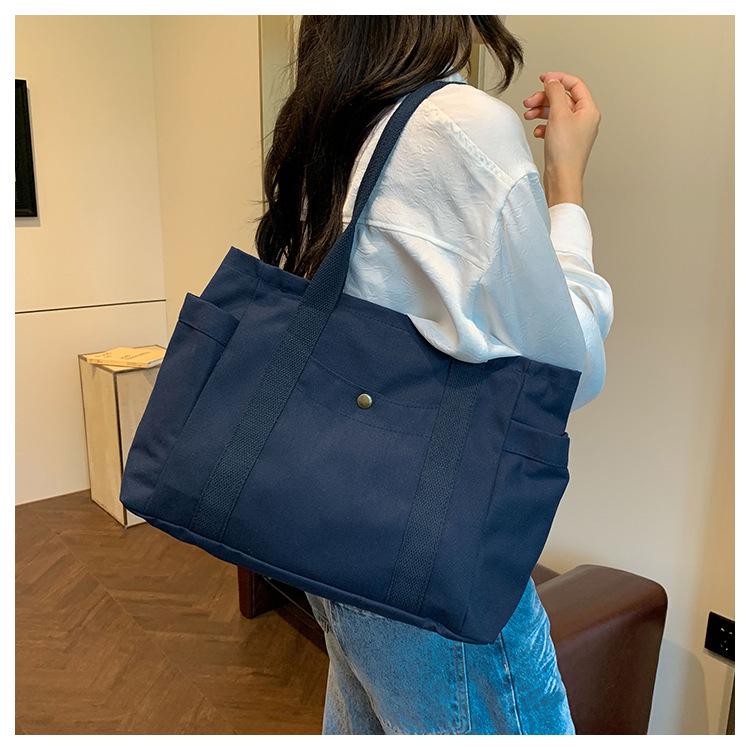 Женская холщовая сумка-тоут: Универсальная вместительная сумка с множеством карманов для студентов и пассажиров