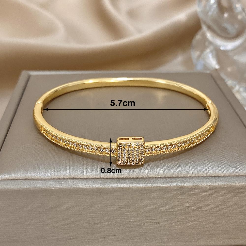 Freetry Exquisite Zircon Golden Plated Bracelet Bangle for Women Luxury Hollow Out Heart Spring Bangle Female Jewelry Gift