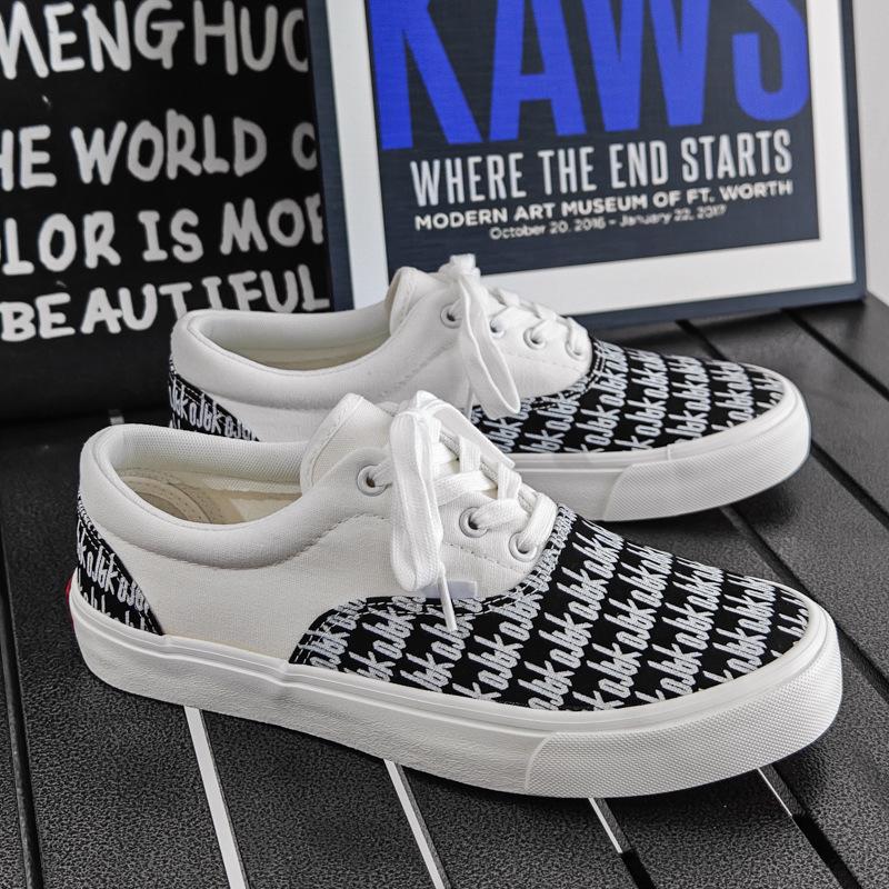 "Douchuan 2025 Весна/Осень Модные низкие парусиновые кроссовки для мужчин: Универсальная повседневная обувь для пар и студентов.