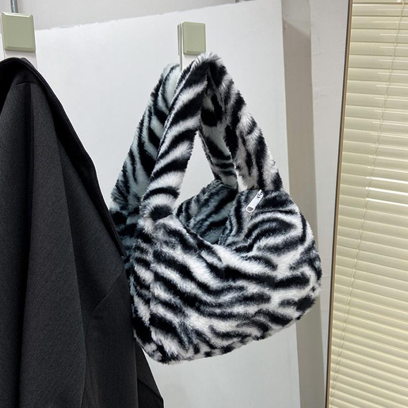 Сумка подмышку через плечо Новая мода Портативная сумка через плечо Западный стиль Пушистое кольцо Леопардовый принт Женская сумка Набитая CLE